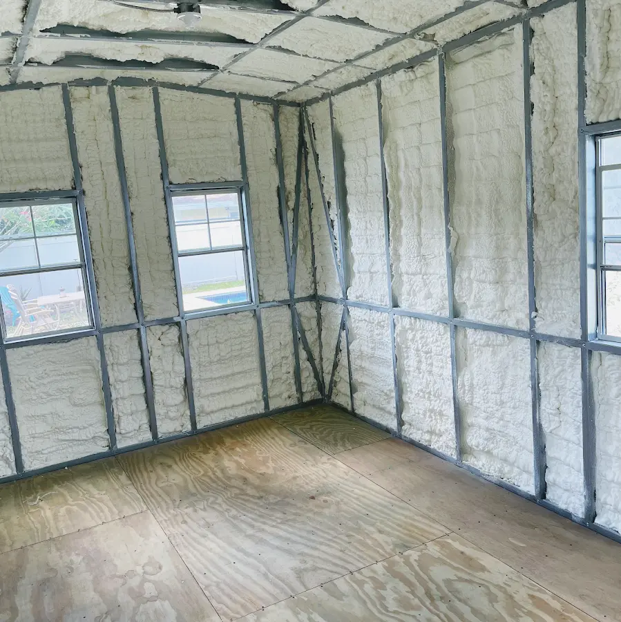 Closed-cell spray foam insulation applied to wall cavities in a residential project in Richland
